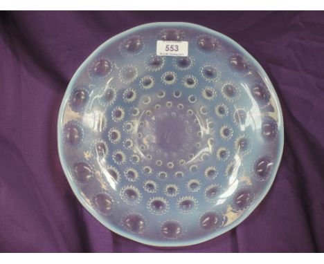 An opalescent glass dish by Lalique in the Aster pattern, etched R Lalique, France, in upper caseCONDITION REPORT - 10 " DIAM