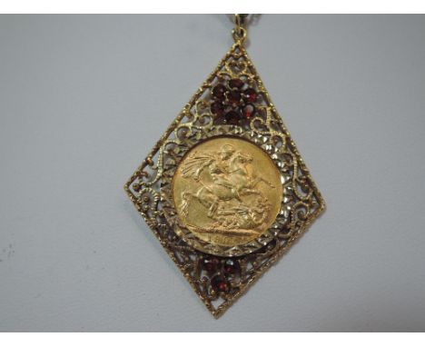 A 1901 gold sovereign, Melbourne mint and Victoria jubilee head, in a removable pendant mount having fire opal style stone de