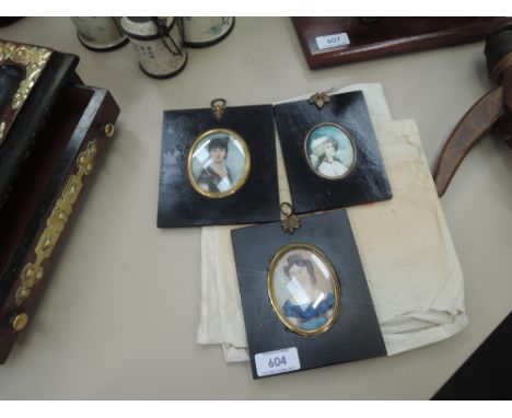 Three early 20th century oval miniature portrait studies, ladies  