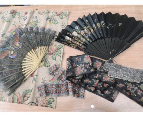 Two beautiful oriental hand painted fans and a small selection of antique textiles and trims.