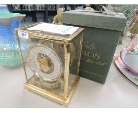 A vintage Le Coultre brass case Atmos, perpetual motion clock, in original box with instructionsCONDITION REPORT not tested f