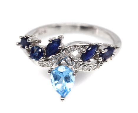 A 925 ring set with a pear cut blue topaz and marquise cut sapphires, (O.5).