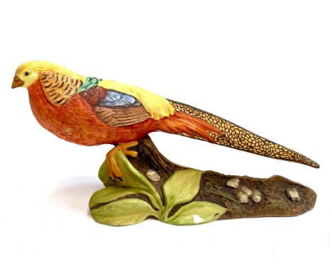 A quantity of figurines to include Goebel Hummel to include Timmy Tiptoes; Tremar pottery wren etc
