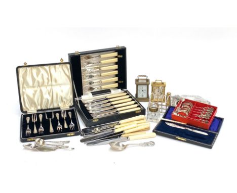 A mixed lot of plated wares to include a 830s white metal spoon, several cased sets, resin handled stainless steel knives, tw