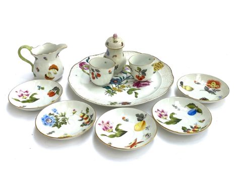 A Herend, Hungary, part tea set, comprising five saucers, two tea cups, milk jug, and pepper shaker (AF), and cake plate, all