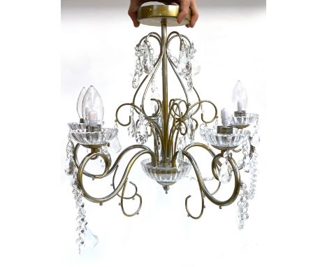 A cut glass five armed chandelier of recent manufacture