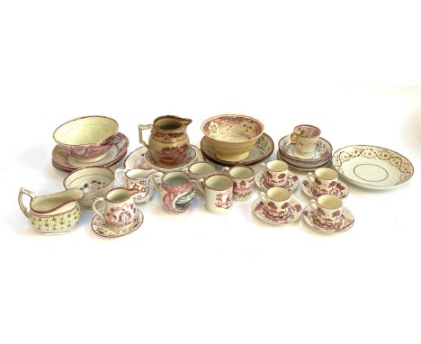 Set of four pink lustre coffee cans and saucers, together with several other small pink lustre cups, Sunderland ware milk jug