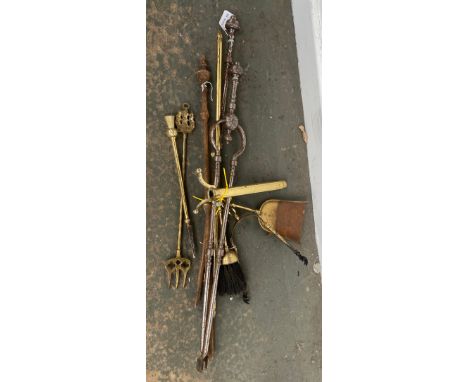 A small quantity of fire tools, to include steel tongs and poker