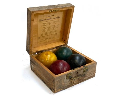 Set of four vintage wooden croquet balls in original locking pine box, from the Army Navy stores