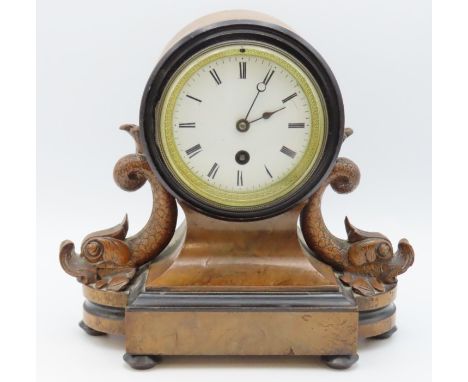 A 19thC. drum head walnut mantle clock with dolphin supports, 226mm tall, with key