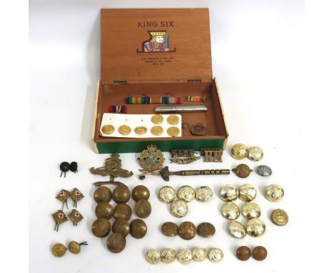 A collection of tunic buttons & badges including RAF, Royal Marines, Redcross & Royal Army Medical Corps