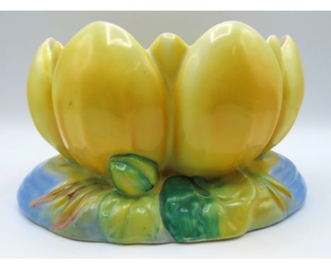 A yellow Clarice Cliff pottery no. 973 lily pad, no chips, very small paint touch up area on blue part of base, probably fact