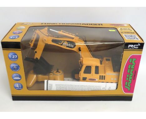 A boxed Jamara 1:27 radio controlled Jmatic Funktionsbagger model tractor digger 