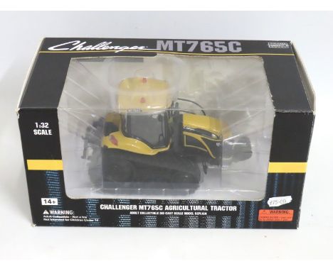 A boxed Agco 1:32 Challenger HT765C diecast model tractor 