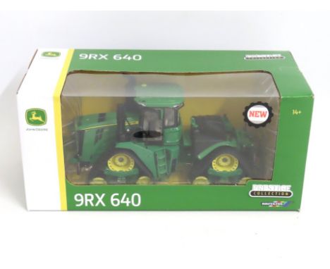 A boxed Britain's 1:32 John Deere 9RX 640 diecast model tractor