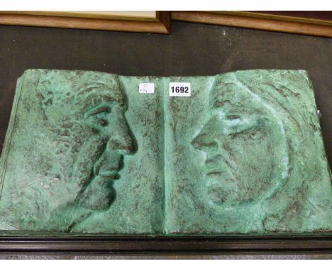 NEMON.  20th.C.SCHOOL.   A BRONZE PLAQUE WITH TWO OPPOSING FACIAL PROFILES, SIGNED.  23 x 47cms.