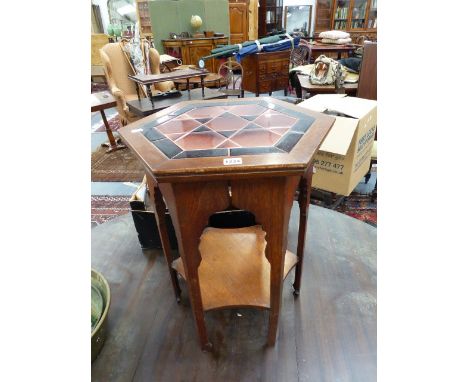 A LIBERTY'S STYLE ARTS AND CRAFTS OCTAGONAL OCCASIONAL TABLE WITH TILE INSET TOP.   H.60cms.