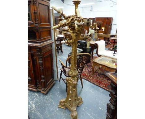AN ANTIQUE CARVED GILTWOOD TORCHERE TEN LIGHT STANDARD LAMP.   H.188cms.