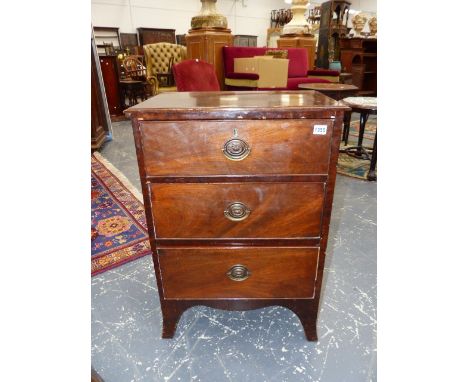 A 19th.C.MAHOGANY SMALL CHEST OF THREE DRAWERS WITH BRASS HANDLES ON SHAPED BRACKET FEET.   56 x 38 x H.80cms.