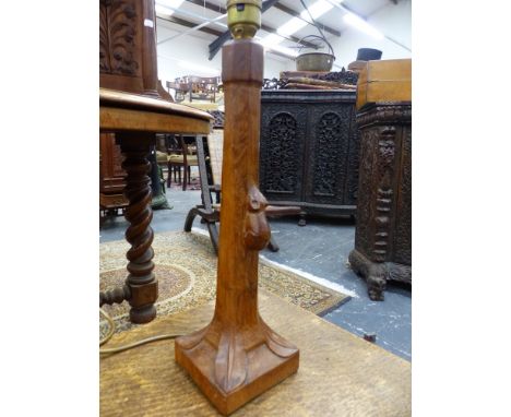 ROBERT THOMPSON, MOUSEMAN.   A PAIR OF TAPERED TABLE LAMPS WITH OCTAGONAL STEP AND LEAF CARVED SQUARE BASES, PLUS FITTINGS.  