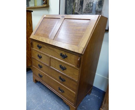 ALAN GRAINGER.  ACORNMAN.   A HAND MADE ENGLISH OAK FALL FRONT BUREAU OVER FIVE DRAWERS ON BRACKET FEET.   W.83.5 x 47 x H.10