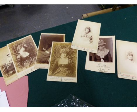 A GROUP OF SEVEN PHOTOGRAPHS OF THE ACTRESS ELLEN TERRY, SOME INSCRIBED TOGETHER WITH A SMALL RED LEATHER ALBUM CONTAINING VI