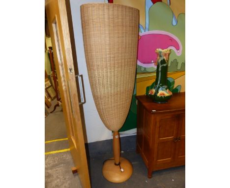 A PAIR OF CONTEMPORARY STANDARD LAMP UPLIGHTERS WITH LARGE RATTAN SHADES.   H.180cms.