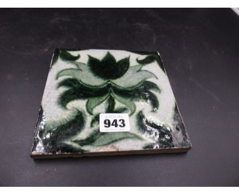 A WILLIAM DE MORGAN MERTON ABBEY GLAZED POTTERY TILE.   15.5 x 15.5cms.