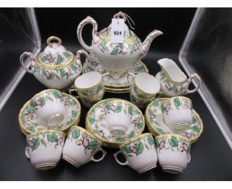 A VICTORIAN STAFFORDSHIRE POTTERY TEA SERVICE WITH VINE LEAF AND FLOWER DECORATION..