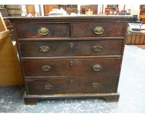 AN 18th.C.OAK CHEST OF TWO SHORT AND THREE LONG DRAWERS  WITH PANELLED SIDES AND RAISED ON BRACKET FEET.   97 x 55 x H.86cms.