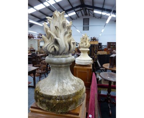 A PAIR OF WEATHERED POTTERY GARDEN / GATE FLAME FORM FINIALS.   H.78cms.