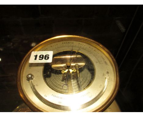 A LATE VICTORIAN HOLOSTERIC ANEROID BAROMETER IN GILT BRASS CASE.