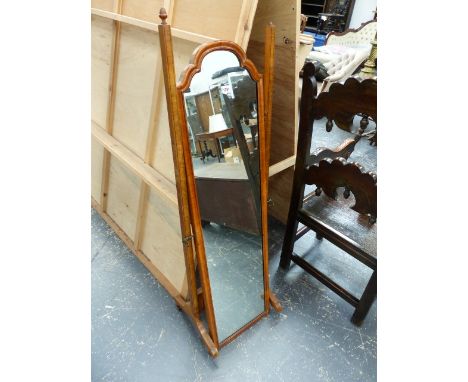 A SMALL WALNUT FRAMED CHEVAL MIRROR, A LIMED OAK STANDARD LAMP AND A DRAWING BOARD.  (3)