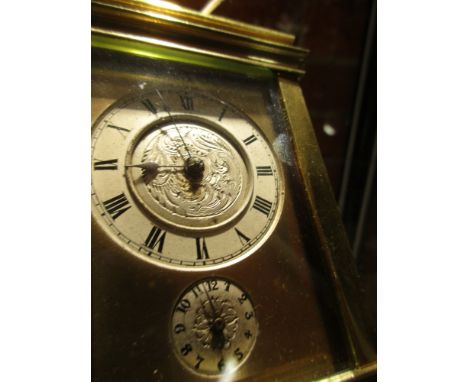A FRENCH GORGE CASED ALARM CARRIAGE CLOCK, THE REPEAT BUTTON ABOVE CIRCULAR SILVERED DIALS, THE STRIKE AND ALARM ON A BELL.  