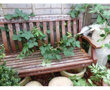 A VINTAGE TEAK GARDEN  BENCH.