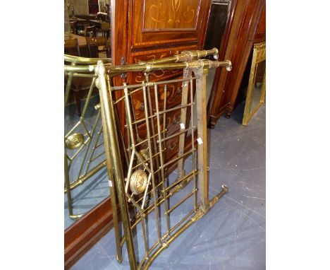 A VICTORIAN BRASS SINGLE BED WITH CERAMIC CASTORS LABELLED R.W.WINFIELD & Co. LONDON.
