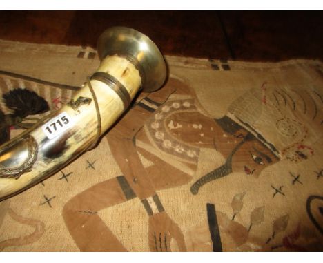 AN ANTIQUE CERAMIC NICHE PLATE MOUNTED HUNTING H ORN TOGETHER WITH A WOVEN HEMP AND APPLIQUE EGYPTIAN WALL HANGING.  (2)