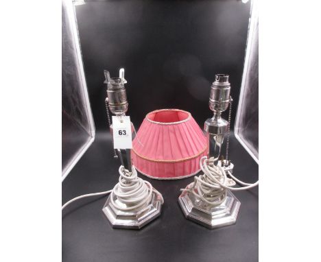 A PAIR OF SILVER HALLMARKED ELECTRIC TABLE LAMP BASES INCLUDING SHADES WITH HEXAGONAL LOADED BASES, DATED 1927, SHEFFIELD,ONE