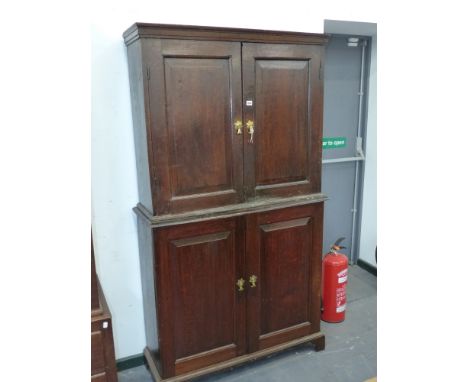 A 19th.C.OAK CABINET WITH FITTED DRAWERS AND PANEL DOORS WITH A SHELVED UPPER SECTION.   W.106 x H.188cms.