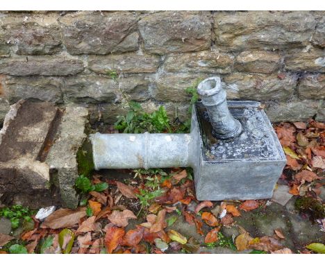 AN ANTIQUE LEAD PUMP HEAD HOPPER.