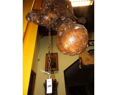 HORROR FILM PROPS.  A WELL CAST RUBBERISED RESIN MODEL OF A CORPSE SUSPENDED BY THE ANKLES.