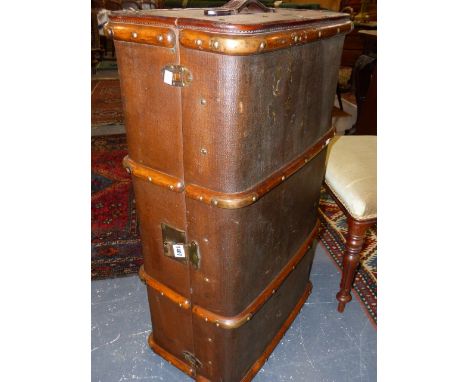 A VINTAGE WOOD BOUND CANVAS CABIN TRUNK WITH BRASS FITTINGS.