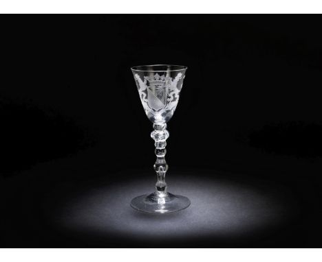 A Dutch engraved light baluster wine glass, circa 1760The round funnel bowl with the Arms of the city of Utrecht beneath a cr