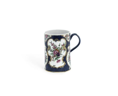 A large Worcester mug, circa 1770Of slightly tapering cylindrical form with a grooved strap handle, painted with garlands of 