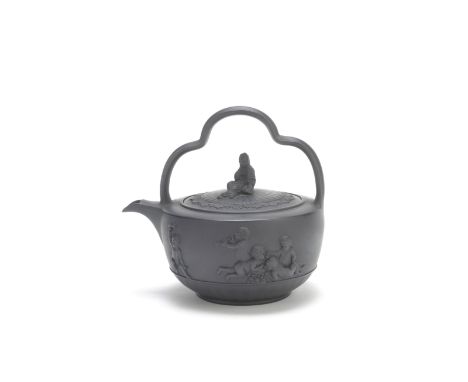 A good Wedgwood and Bentley black basalt rum kettle and cover, circa 1775Of shallow circular form with a short spout and a lo