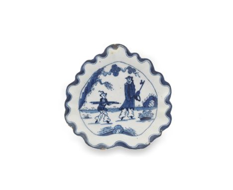 A Bow small sweetmeat dish, circa 1758Heart-shaped with a fluted rim, painted in underglaze blue with the 'Golfer and Caddy' 