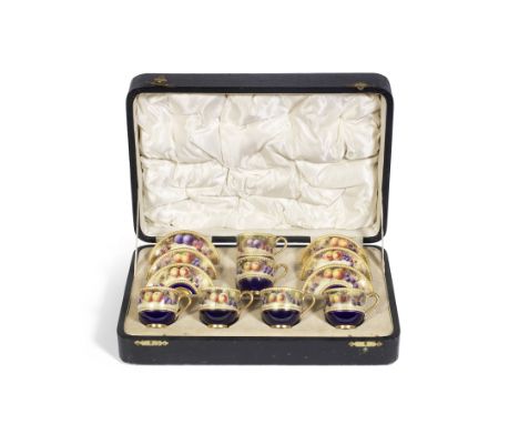 A Royal Worcester 'painted fruit' boxed coffee set, dated 1920Painted with continuous bands of autumn fruits set against a mo
