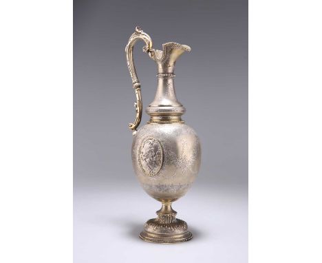 A FINE VICTORIAN SILVER-GILT EWER by Alexander Macrae, London 1865, the ovoid body engraved with bands of leaves and swags, a