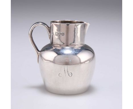 A LATE VICTORIAN SILVER MINIATURE CREAM JUG by Henry Stratford, London 1899, of shouldered baluster form with a sparrow-beak,