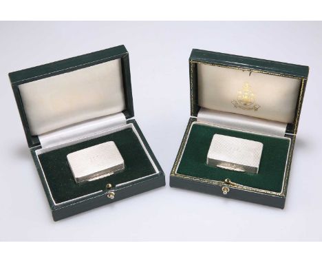 A PAIR OF ELIZABETH II SILVER SNUFF BOXES by PJD Silver Ltd, Birmingham 1993 and 1997, both rounded rectangular, with all-ove